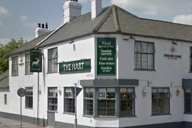 Three men forced entry into the Hart of Duston and made off three cash