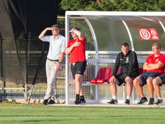 WORK TO DO: Dean Austin watches on as his side battle their way to a 1-0 victory over Brackley Town at St James Park on Tuesday evening. Picture: Kirsty Edmonds