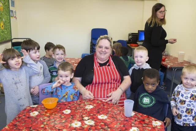 Readers fundraising efforts paid for nursery cook to dish up hot meals for pupils
