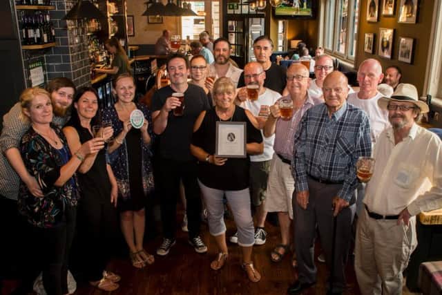 Friends of John raised a toast to the former brewer at the Market Tavern on Monday night. Picture: Leila Coker.