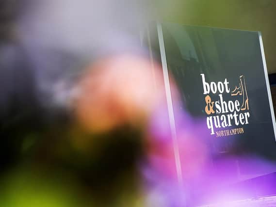 Northampton's Boot & Shoe Quatre attracts thousands of international visitors every year but shoemaker bosses say more should be done to keep tourists in the town centre.
