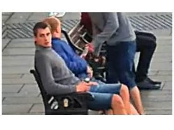 The man pictured is wanted in connection with an attack in Northampton town centre.