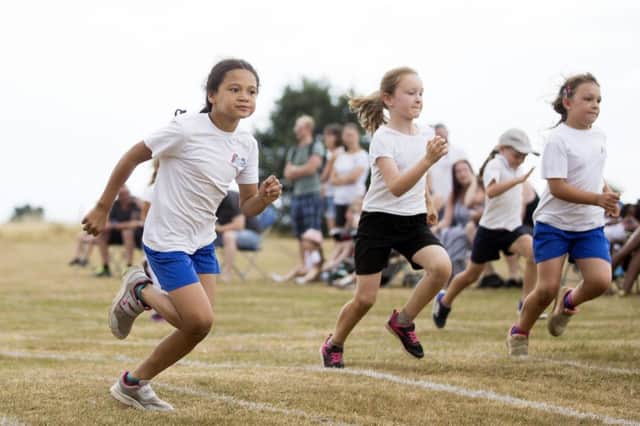 Smiles galore as children take part in their annual sports day. Credit: Kirsty Edmonds.