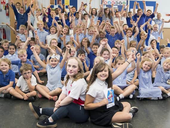 Ellie Robinson MBE (front left) popped into visit Brooke at The Bramptons Primary School on Wednesday (July 18) where she talked to pupils in assembly and met Brooke (front right).