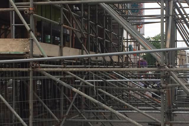 Business owners nearby have called the scaffolding "an eyesore" and a "disgrace".