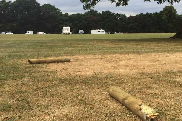 Traveller camps have been a regular feature of Northampton's parks again this summer. A set of bollards intended to deter such encampments at Abington Park, above, were ripped up.