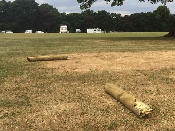 Traveller camps have been a regular feature of Northampton's parks again this summer. A set of bollards intended to deter such encampments at Abington Park, above, were ripped up.