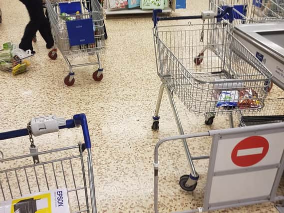 Trolleys abandoned as shoppers are evacuated from Weston Favell Shopping Centre. Picture via @rickyd70
