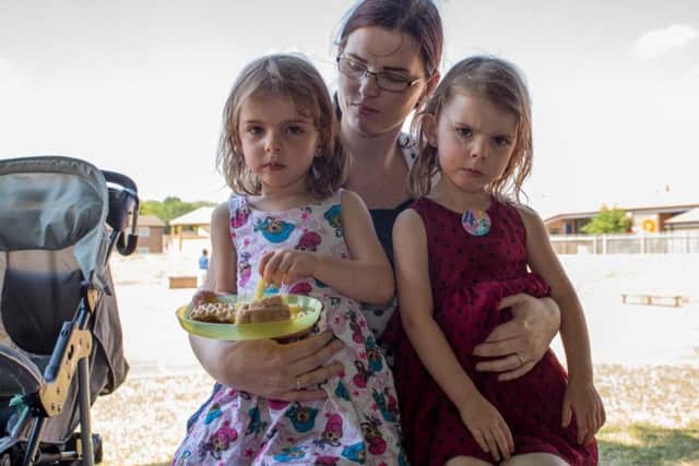 Nicole Wallace with her four-year-old twin girls. Pictures: Leila Coker.
