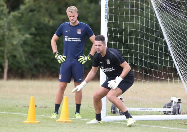 New Cobblers goalkeeping coach got straight down to work with Lewis Ward at Moulton College on Thursday morning (Picture: Pete Norton)