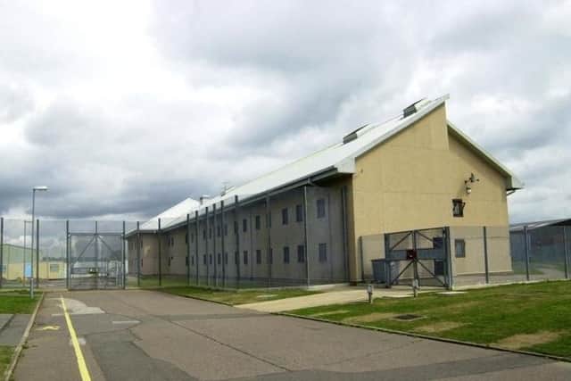 Shian Johnson was caught trying to chuck a package of drugs and alcohol over the perimeter of HMP Onley.