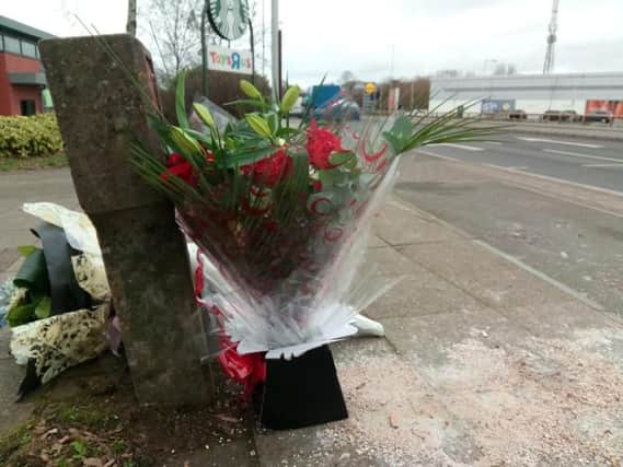 Flowers were left near the scene of the accident in Towcester Road.