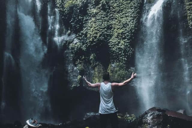 Gareth pictured on his travels at the Sekumpul Waterfall in Bali.