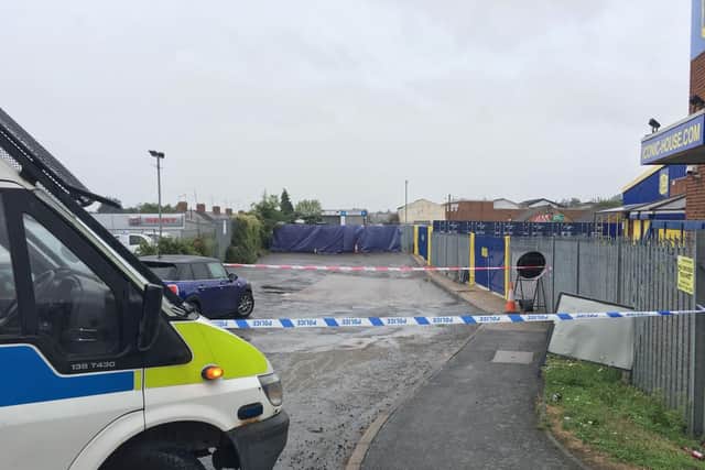 Police tape off Horsley Road in Northampton where forensics are on the scene