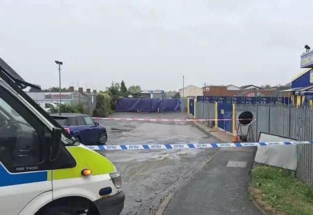 Police tape off Horsley Road in Northampton where forensics are on the scene