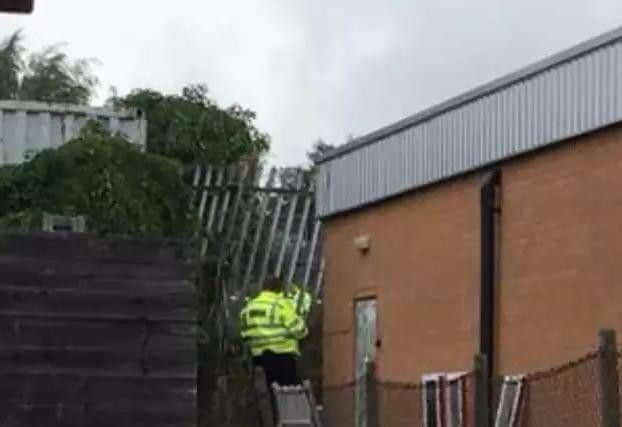Police tape off Horsley Road in Northampton where forensics are on the scene