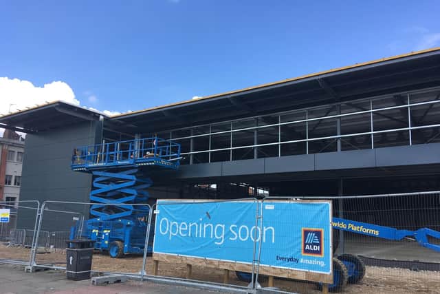 Construction of the new Aldi store is progressing wlll and the steel frame is now in place