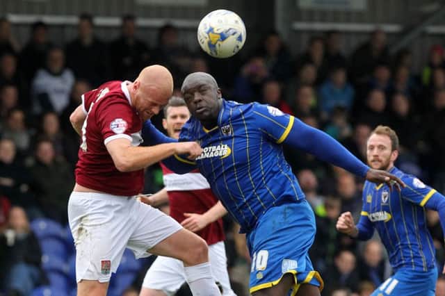 The beast is back: Tonight will be the sixth time Akinfenwa has come up against his former club since leaving in 2013