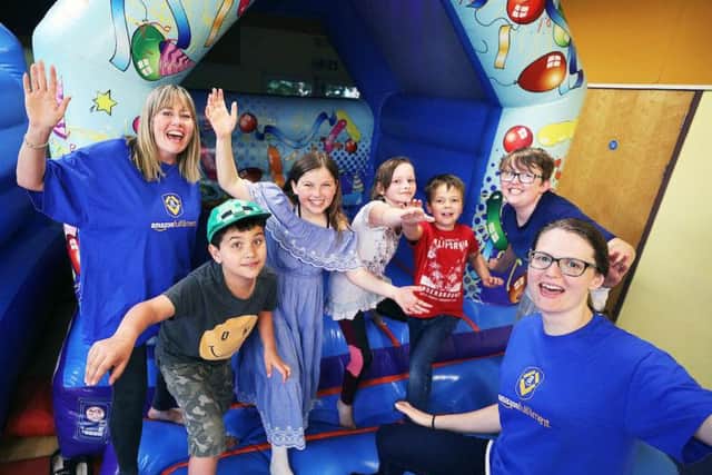 (L to R) Rachel Norris, Sebi (8), Sophie-Mae (11), Macey-Rose (11), Jake (9), Alfe (14) and Timea Toth