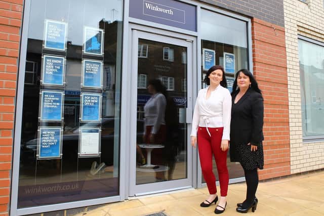Sinead Hart, left, and Claire Millward, right, outside the new Winkworth Estate Agents in Wellingborough Road.