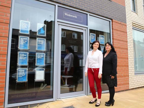 Sinead Hart, left, and Claire Millward, right, outside the new Winkworth Estate Agents in Wellingborough Road.