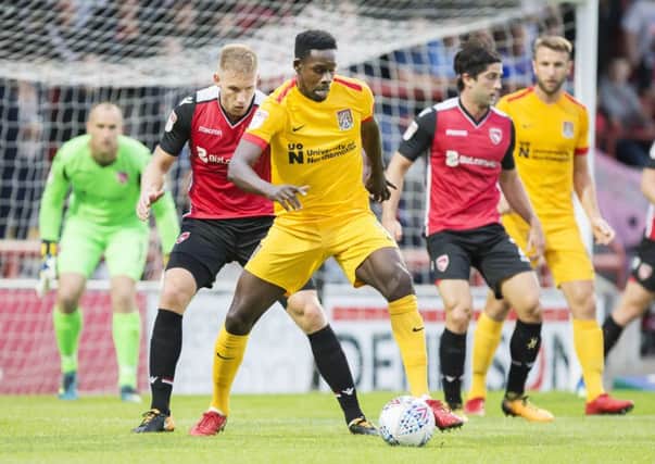Leon Barnett in action during Tuesday's defeat at Morecambe (Picture: Kirsty Edmonds)
