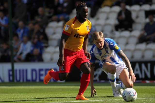 FIRST START: Junior Morias made his full league debut for the Cobblers at Colchester. Picture: Sharon Lucey