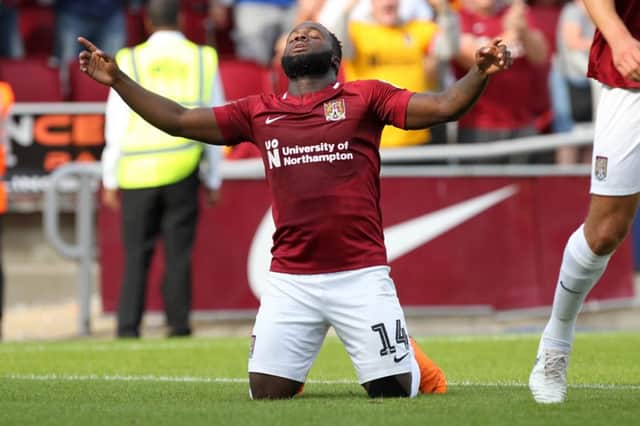 HIGH TO LOW: Six minutes after celebrating his first Cobblers goal, Junior Morias pulled his hamstring and looks set to be sidelined for several weeks. Pictures: Sharon Lucey
