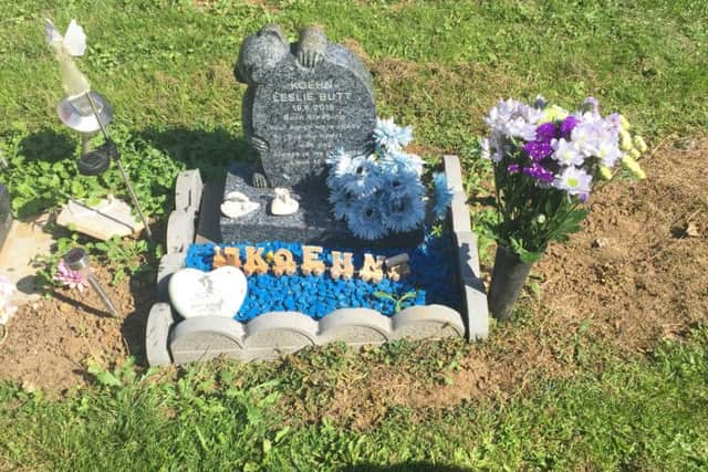 Blue stones from Koehn's grave were found scattered around Dallington Cemetery.