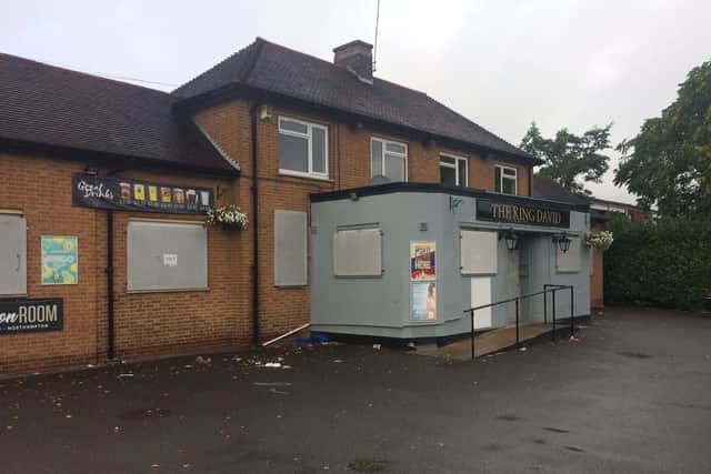Metal security shutters have been installed on the pub's entrances and windows.