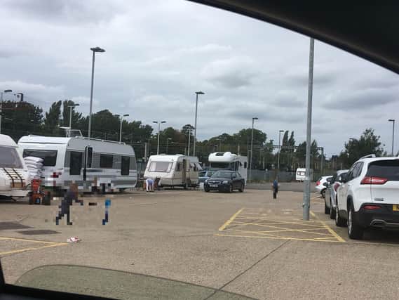 Nine caravans have reportedly been spotted on the railway station car park.