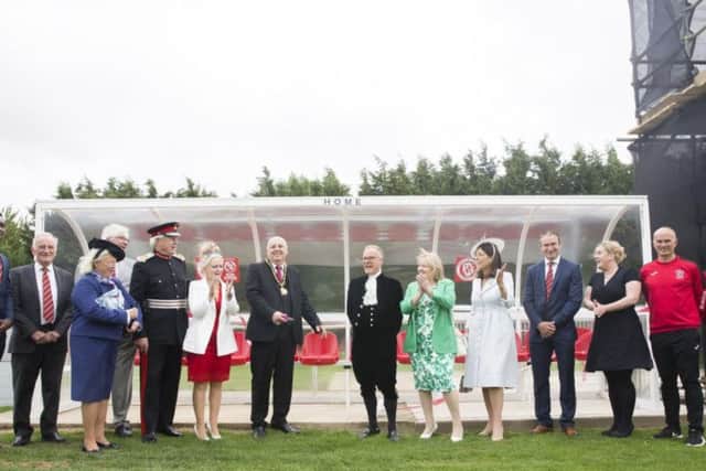 Brackley Town Mayor Mark Morrell (centre left) officially opens the new dugouts alongside James Saunders Watson, the High Sheriff of Northamptonshire (centre right) (picture: Kirsty Edmonds)