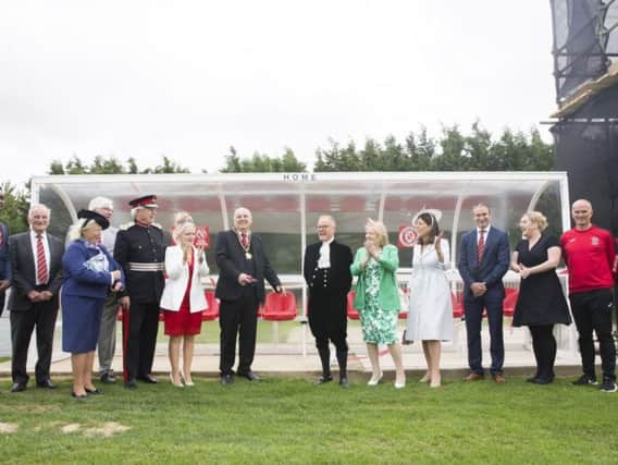 Brackley Town Mayor Mark Morrell (centre left) officially opens the new dugouts alongside James Saunders Watson, the High Sheriff of Northamptonshire (centre right) (picture: Kirsty Edmonds)