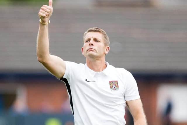 Dean Austin insists he did noth criticise the Cobblers supporters following Saturday's defeat to Cheltenhan