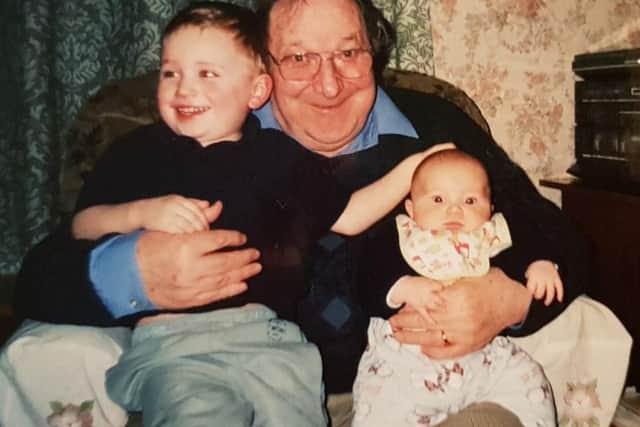 Johnny pictured with his grandchildren Jack and Charlie