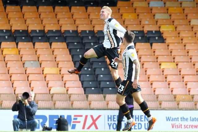 Ben Whitfield celebrates the opener for Port Vale. Picture by Sharon Lucey