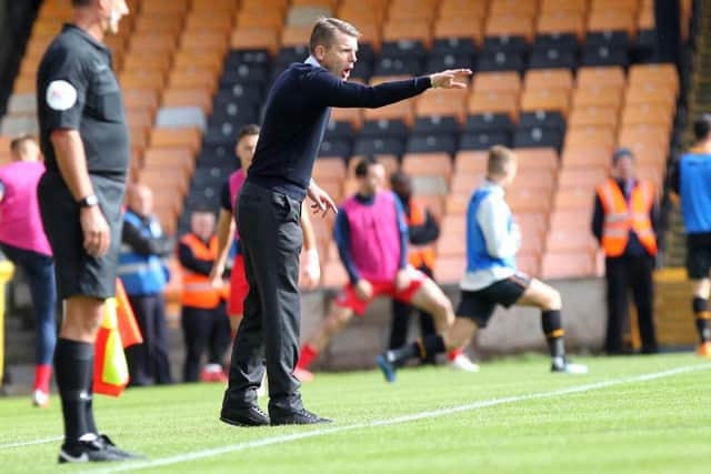 Dean Austin barks instructions from the sidelines during the 2-0 defeat to Port Vale. Picture by Sharon Lucey.