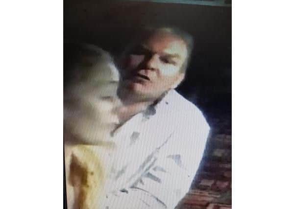 Police want to speak to this man in connection with a racially aggravated assault at a Northampton pub.