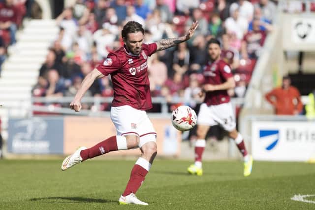 HAPPIER DAYS... Ricky Holmes scored a sumptuous volley en route to Town's title success the last time Notts County visited Northampton