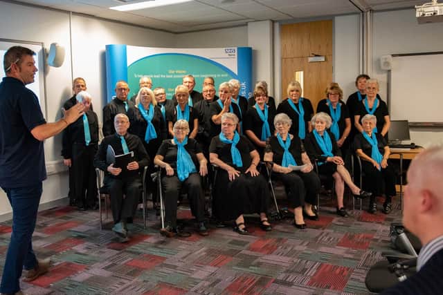 The Singing 4 Breathing choir gave its first performance of We Stand Together  Stay Well this Winter at Francis Crick House.