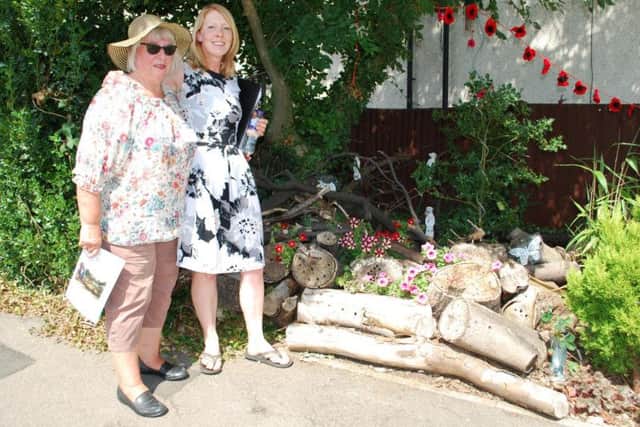 Dee Whitehead and Jacqueline Abbott from the Far Cotton Land Girls, next to their display in Lancaster Way.