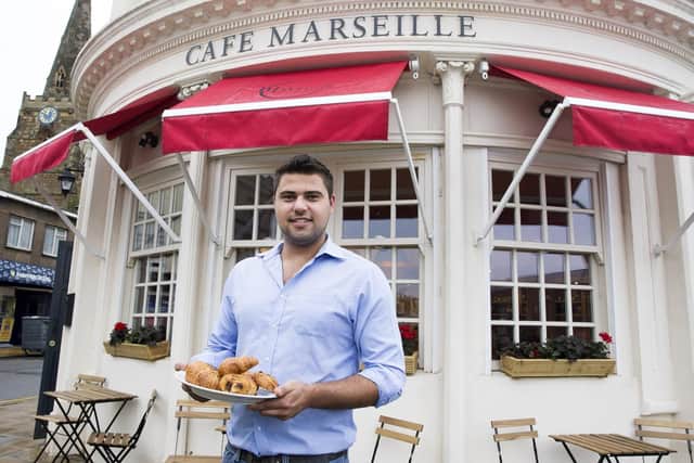 Restaurant manager Dennis Potapenko pictured outside Cafe Marseille on Sheep Street.