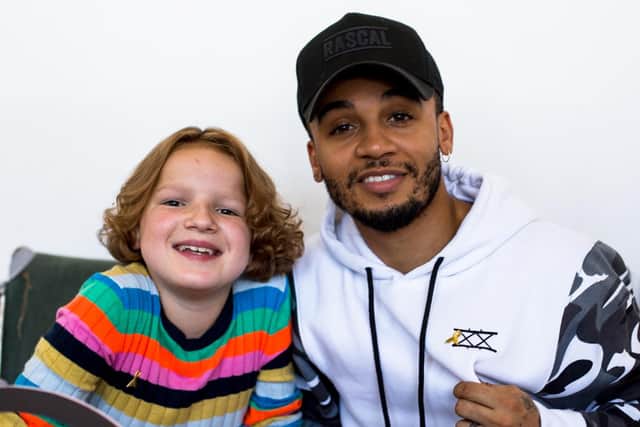 Maisie Bullock pictured with Aston Merrygold.