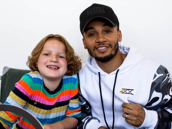Maisie Bullock pictured with Aston Merrygold.