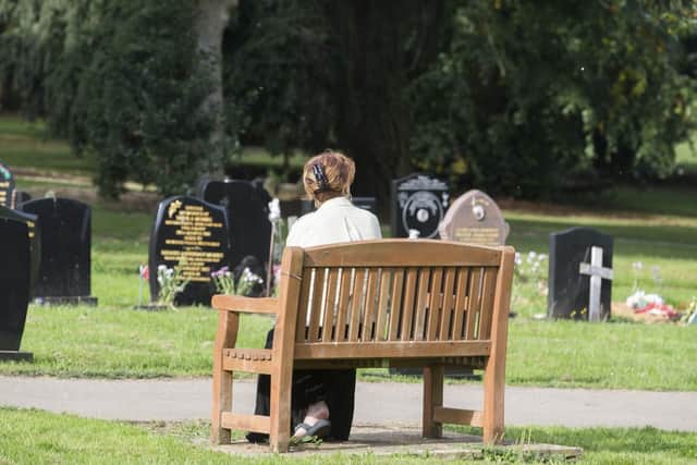 Sally Nicholson, who visits the graveyard a few times a week to pay her respects, is campaigning for a fence to be put up in Dallington Cemetery after items from her loved ones graves have recently been binned.