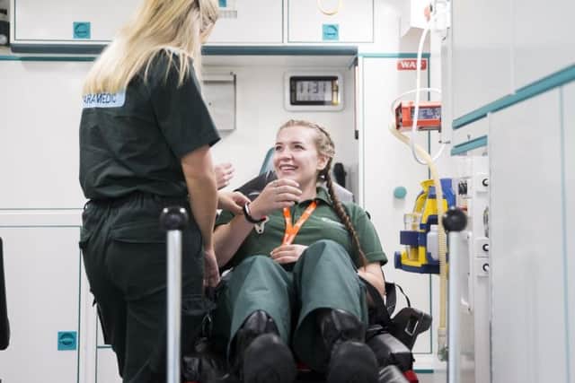 Paramedic science students carry out assessments in the purpose-built on-site ambulance.