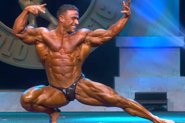 Kamal poses during his winning routine at the Arnold Classic 212 in March. Image courtesy of Generation Iron Fitness Network.