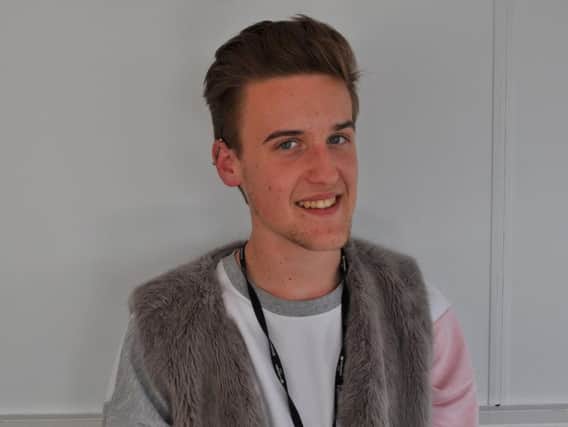 Lewis Parry, a health and social care student at the colleges Booth Lane campus, was given a round of applause after placing a stricken woman into the recovery position on his way into class.