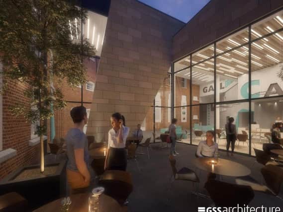 A cafe terrace will be created between the Guildhall Road and former gaol blocks.
