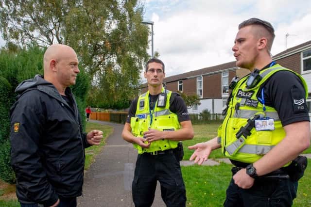 Ross Kemp came to town yesterday to revisit the site where one police officer was stabbed four years ago. Kemp  (on the left) is pictured with PC Monk and PC Liddle.